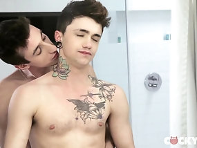 Tattooed twink bends over to have a dick inside his asshole